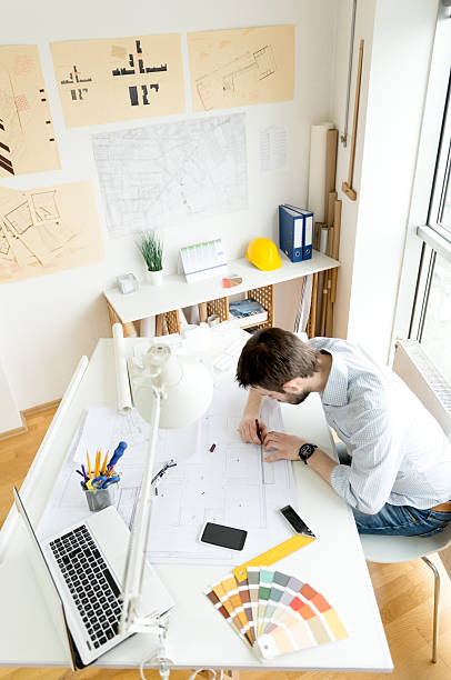 Young male architect working on a new project. Horizontal shot. img-4